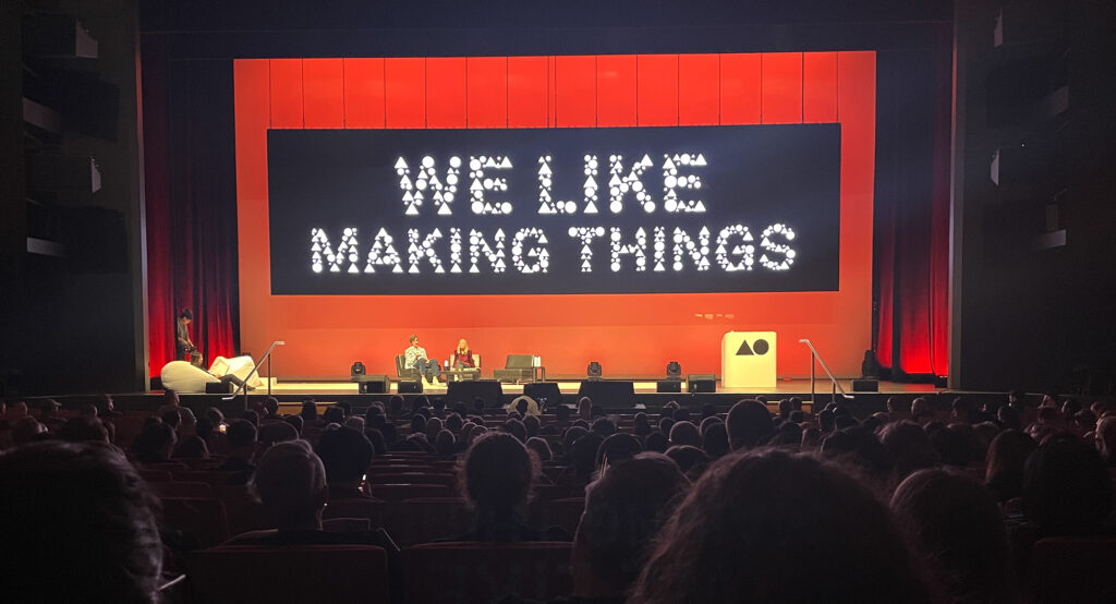 AGI Open in Auckland NZ, paula Scher on stage with Stefan Sagmeister